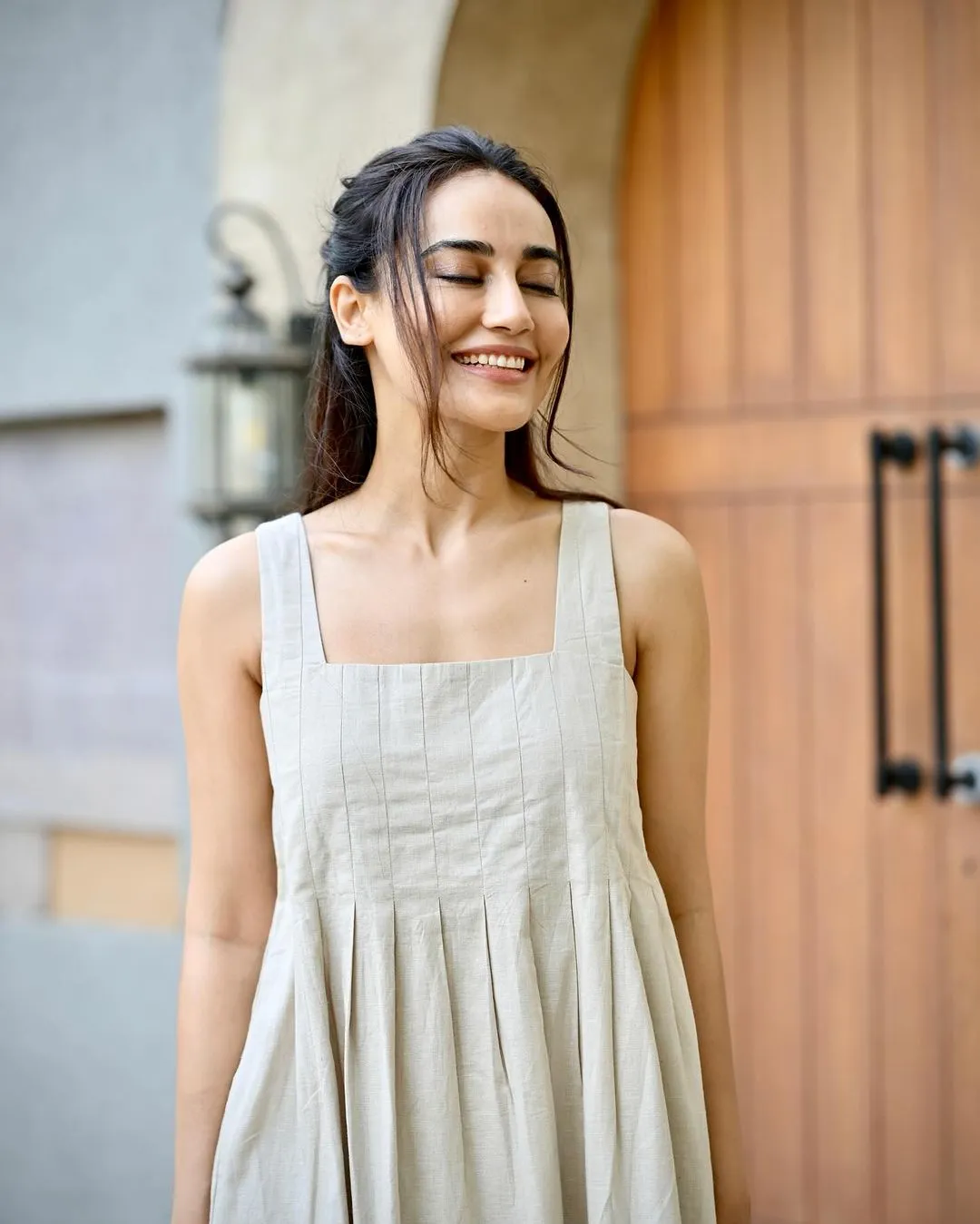 Surbhi Jyoti looks elegant in a simple white dress.